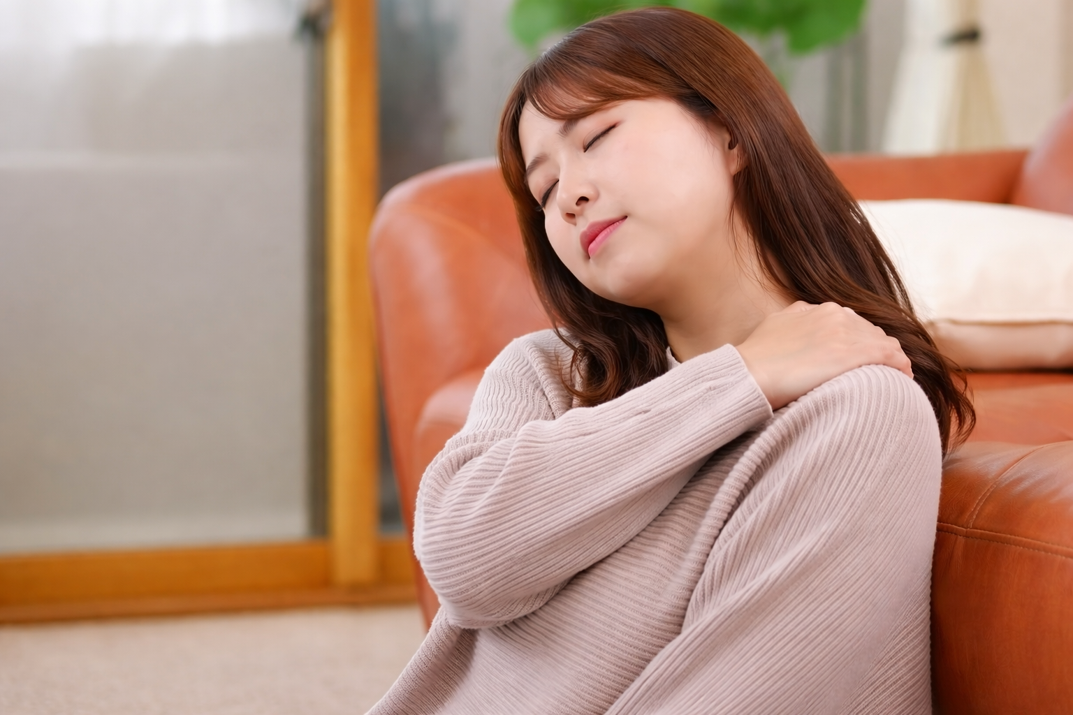 不調を我慢しているイメージ